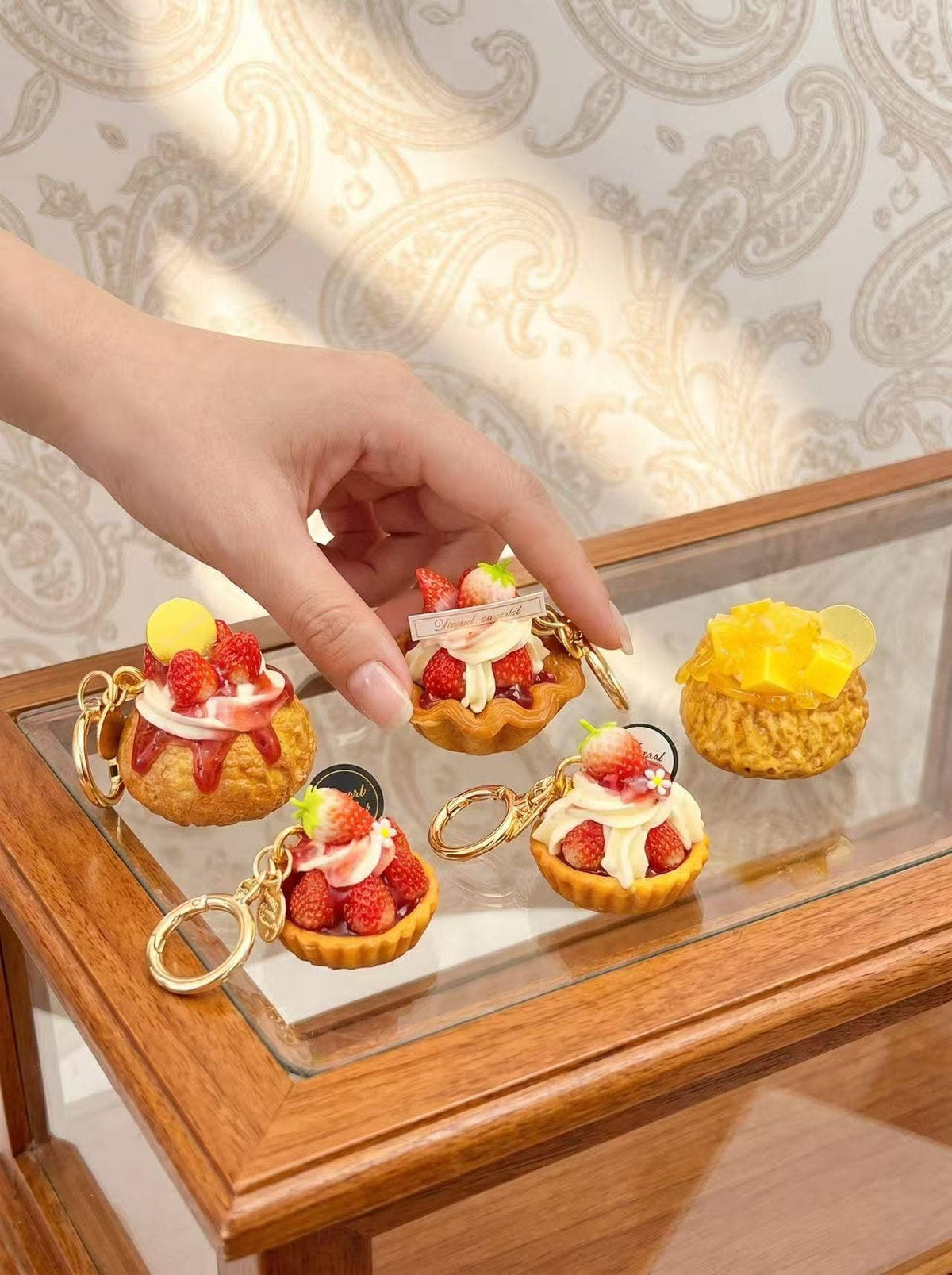 Nyckelring/väsksmycke Petit choux, två varianter